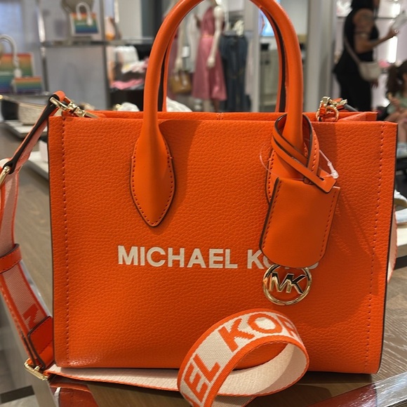 Michael Kors Mirella Small Pebbled Leather Shopper Top Zip Crossbody XBODY
Poppy - Picture 10 of 16